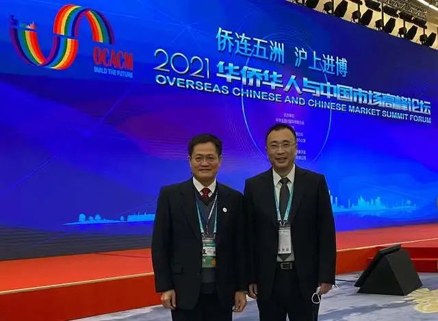 張漢霆與上海市僑聯副主席陶勇合影